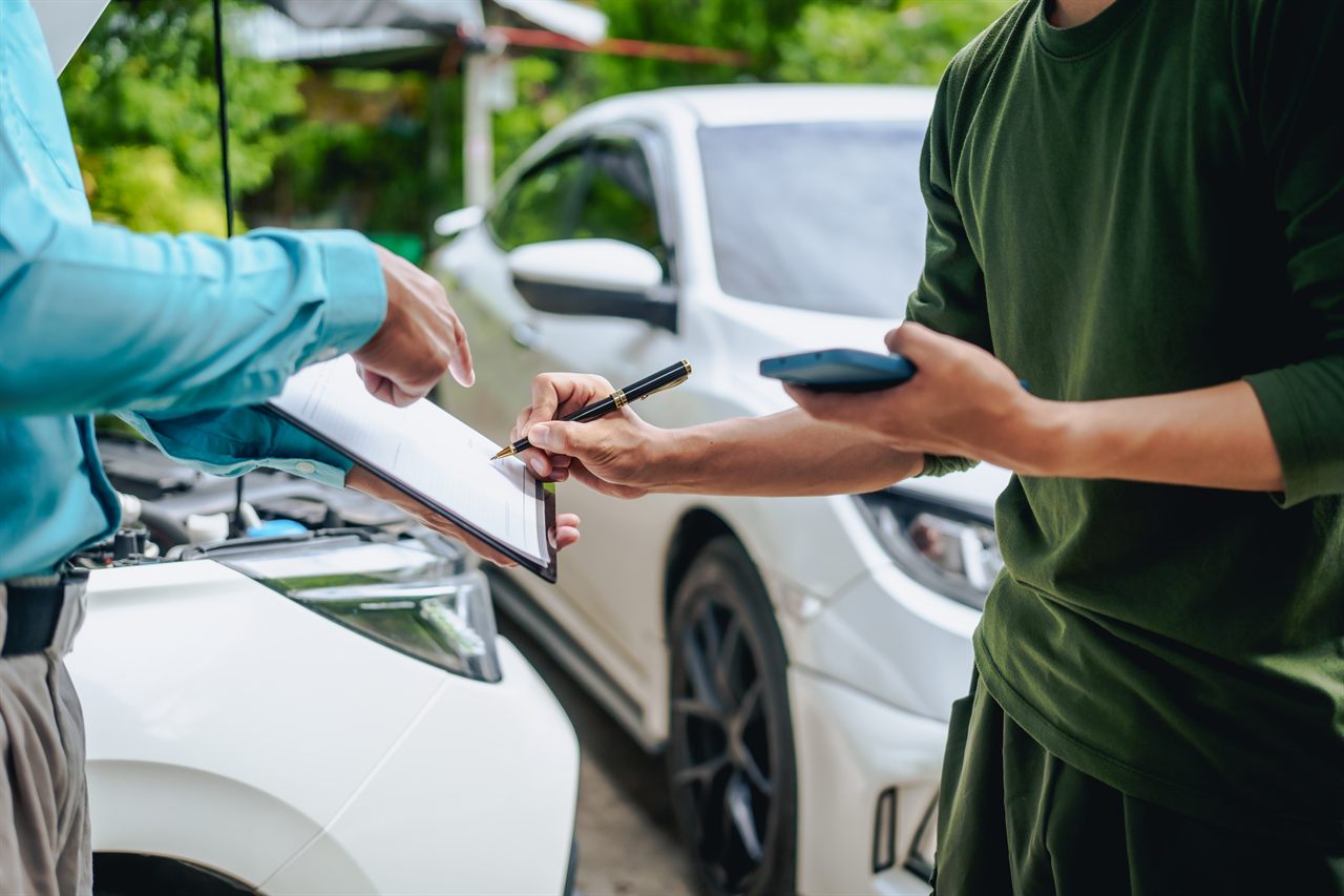 Signature d'une lettre de résiliation d'assurance auto